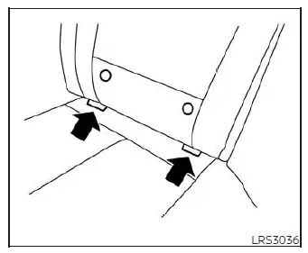 Close-up view of the LATCH lower anchor bars located in the crease between the seatback and seat cushion of a Nissan Versa