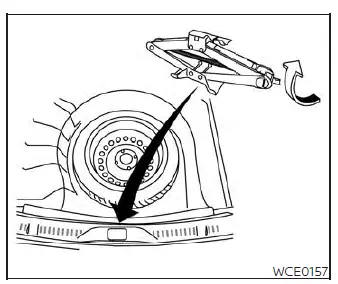 Storing the jack and securing equipment in the trunk of a Nissan Versa