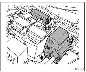 Accessing the under-hood engine compartment fuse box cover on a Nissan Versa