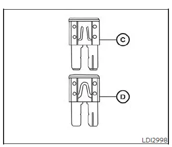 Replacing a blown interior fuse with a new fuse using a fuse puller in a Nissan Versa