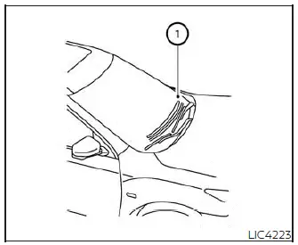 Location of the ambient light autolight sensor on the top-left driver side of the Nissan Versa instrument panel dashboard
