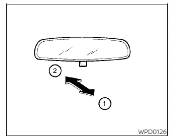 Adjusting the day/night lever on the Nissan Versa interior rearview mirror to reduce night glare