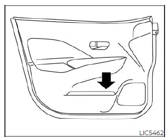 Molded bottle holder located in the lower front door panel pocket of the Nissan Versa