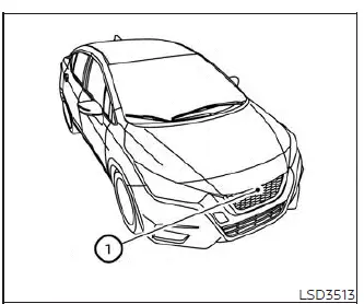Location of the front radar sensor for the Intelligent Cruise Control system on a Nissan Versa