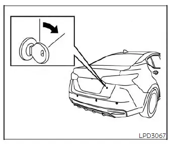 Using the mechanical key to unlock the Nissan Versa trunk lid via the key cylinder