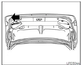 Glow-in-the-dark emergency interior trunk release handle on the inside of the Nissan Versa trunk lid