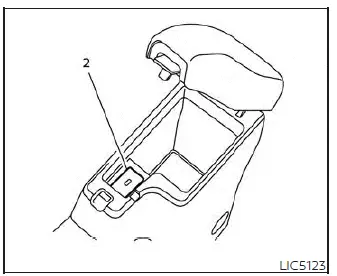 Inside the center console storage box of the Nissan Versa showing the protected USB charging ports