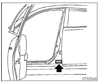 Federal and Canadian Motor Vehicle Safety Standard certification label affixed to the Nissan Versa door pillar
