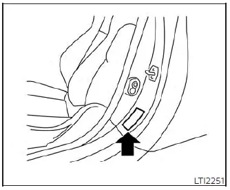 Tire and Loading Information pressure certification label location on the Nissan Versa door jamb