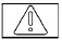 Yellow master warning light displaying an exclamation mark inside a triangle on the Nissan Versa instrument panel
