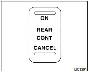 The rear control cancel switch operates when the