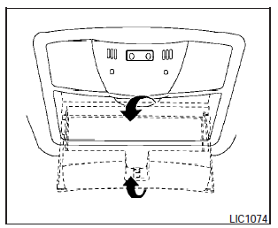 To open the sunglasses holder, push and release.